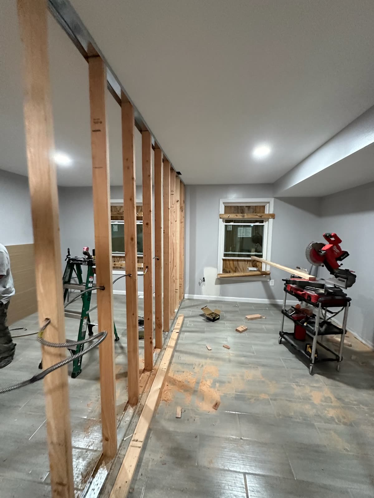 Two-bedroom basement apartment — real ARCED project photo 4 of 19