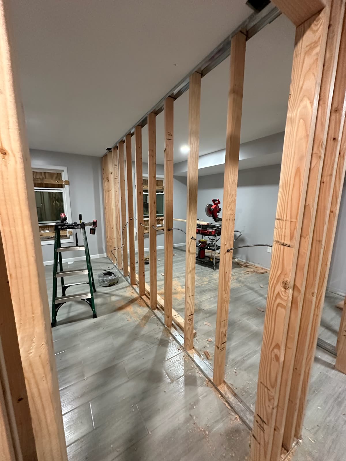 Active ARCED renovation site during framing and debris removal