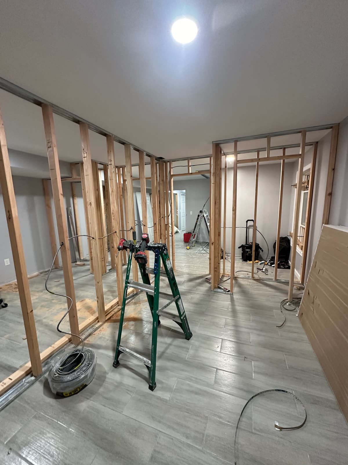 Two-bedroom basement apartment — real ARCED project photo 6 of 19