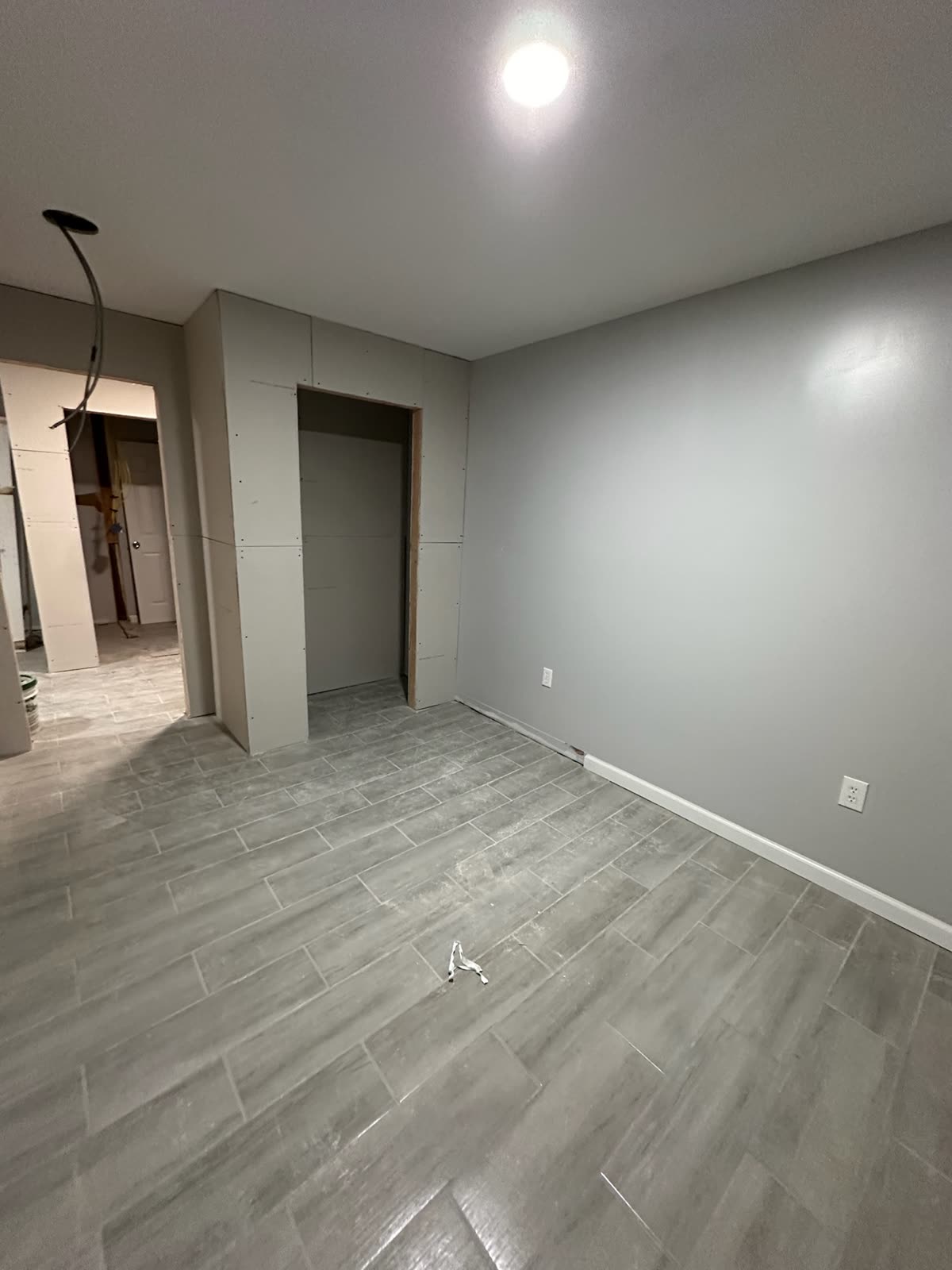 Two-bedroom basement apartment — real ARCED project photo 10 of 19