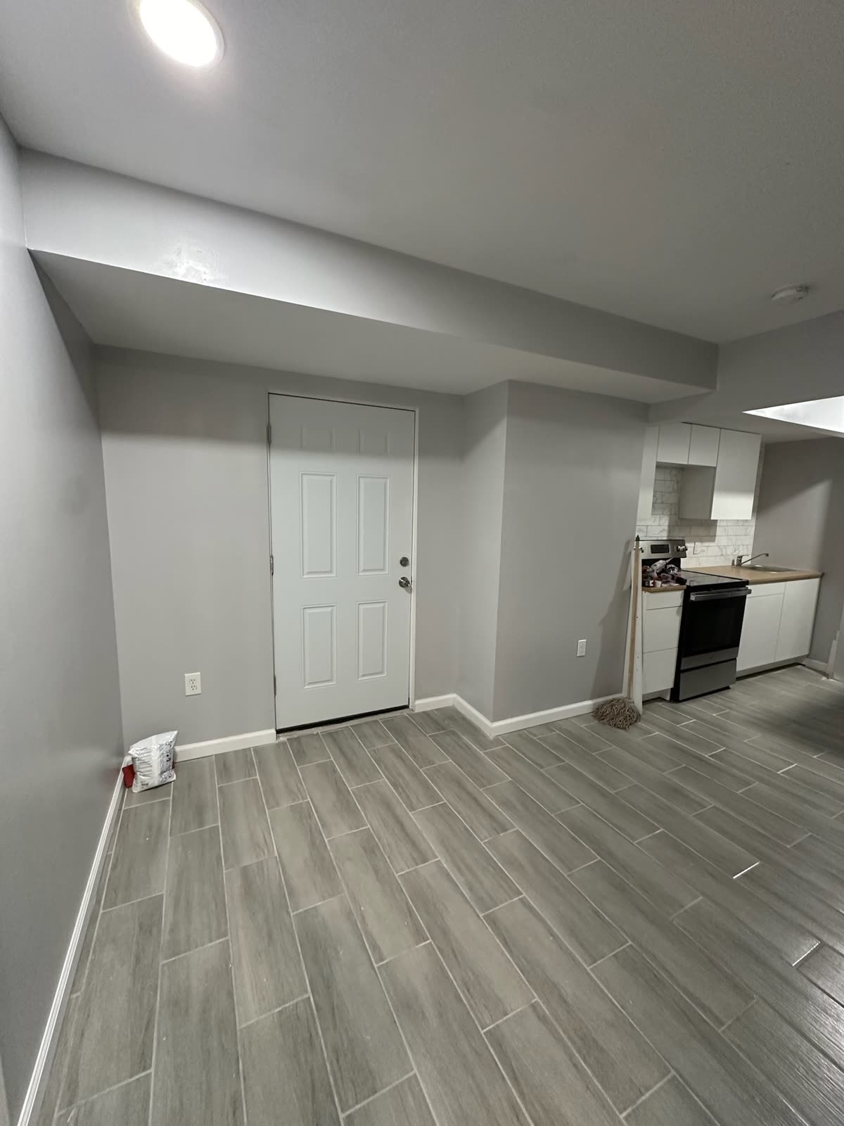 Two-bedroom basement apartment — real ARCED project photo 19 of 19