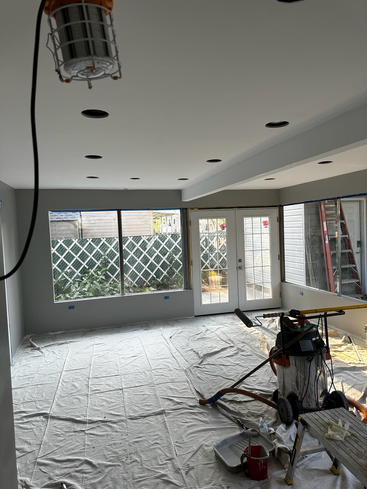 ARCED interior renovation in progress with new lighting, walls and finish preparation