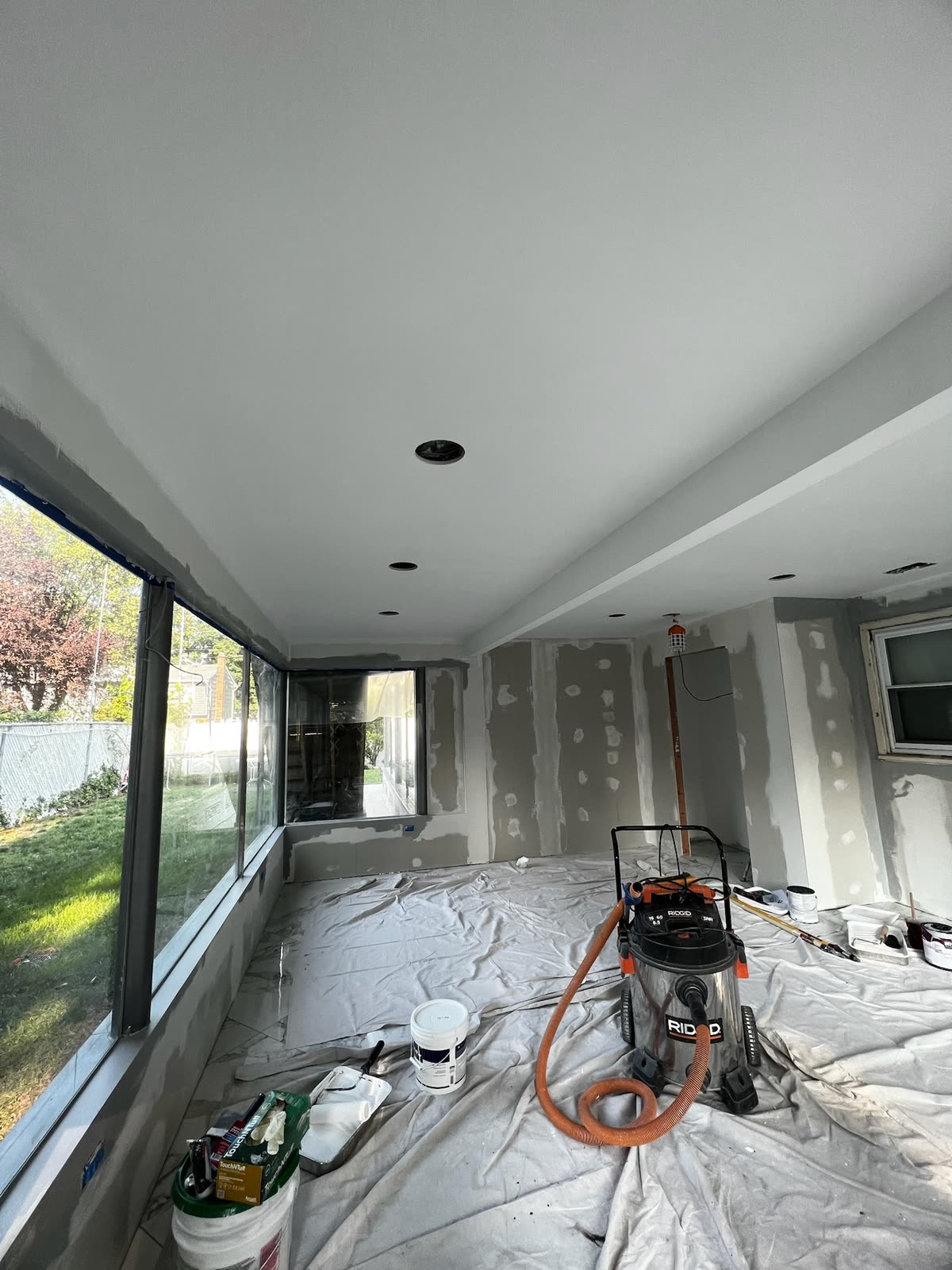 Enclosed home addition during ARCED drywall and finish preparation