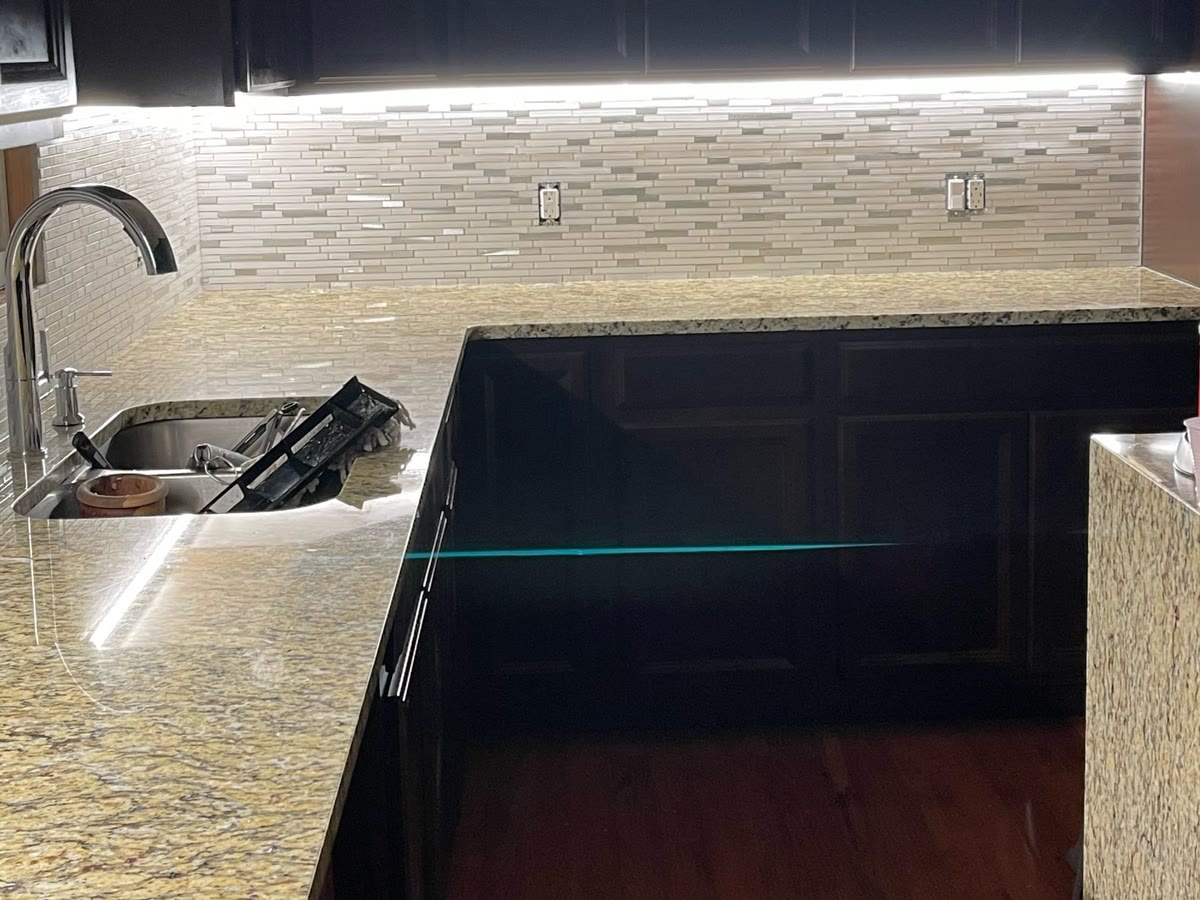 Finished Northern New Jersey kitchen remodel by ARCED with custom cabinetry, stone counters and tile backsplash